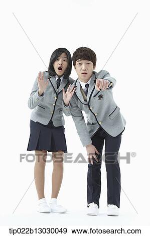 a boy and a girl in school uniforms View Large Photo Image Stock Photo - a boy and a girl in school uniforms. Fotosearch
