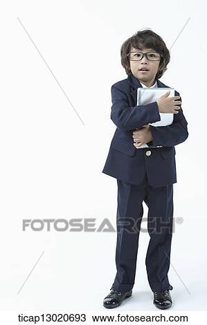 a boy dressed up as a business man View Large Photo Image Stock Image - a boy dressed up as a business man. Fotosearch
