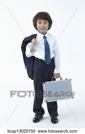 a boy dressed up as a business man View Large Photo Image Stock Image - a boy dressed up as a business man. Fotosearch
