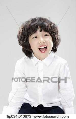 a boy in white shirt shouting View Large Photo Image Stock Image - a boy in white shirt shouting. Fotosearch