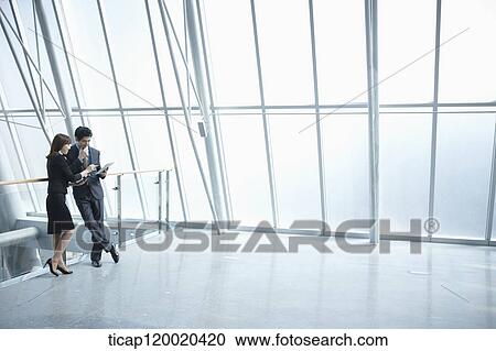 a business man and a business woman View Large Photo Image Stock Image - a business man and a business woman. Fotosearch