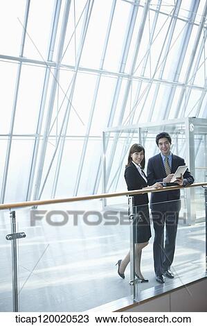 a business man and a business woman View Large Photo Image Stock Image - a business man and a business woman. Fotosearch
