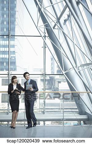 a business man and a business woman View Large Photo Image Stock Photo - a business man and a business woman. Fotosearch