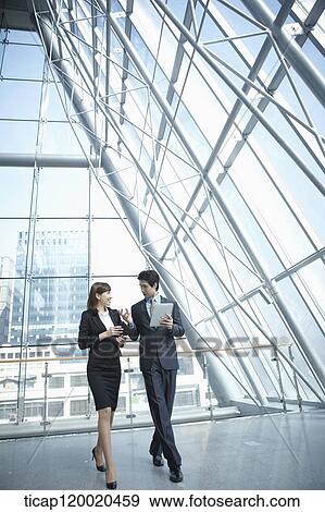 a business man and a business woman View Large Photo Image Stock Photo - a business man and a business woman. Fotosearch