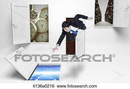 a business man flying into a hole View Large Photo Image Stock Photograph - a business man flying into a hole. Fotosearch