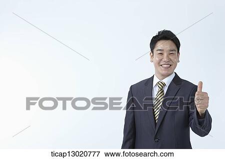 a business man giving thumbs up View Large Photo Image Stock Photo - a business man giving thumbs up. Fotosearch