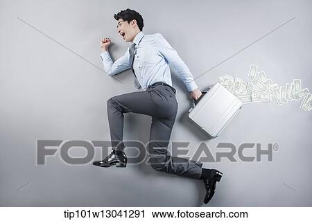 a business man lying on the floor in a walking pose View Large Photo Image Stock Image - a business man lying on the floor in a walking pose. Fotosearch