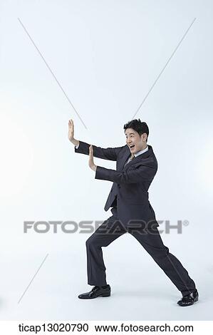 a business man posing View Large Photo Image Stock Image - a business man posing. Fotosearch