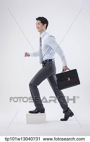 a business man with a case View Large Photo Image Stock Image - a business man with a case. Fotosearch