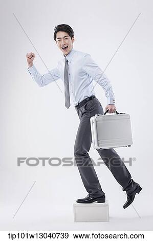 a business man with a case View Large Photo Image Stock Photo - a business man with a case. Fotosearch