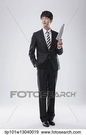 a business man with a folder View Large Photo Image Stock Photo - a business man with a folder. Fotosearch