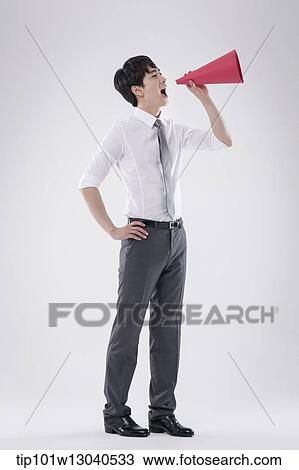 a business man with a paper megaphone View Large Photo Image Stock Image - a business man with a paper megaphone. Fotosearch