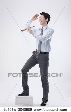 a business man with a telescope View Large Photo Image Stock Photo - a business man with a telescope. Fotosearch