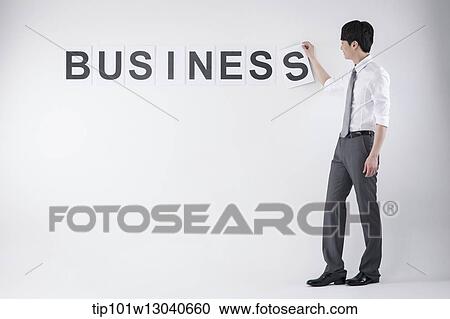 a business man with the word business View Large Photo Image Stock Image - a business man with the word business. Fotosearch