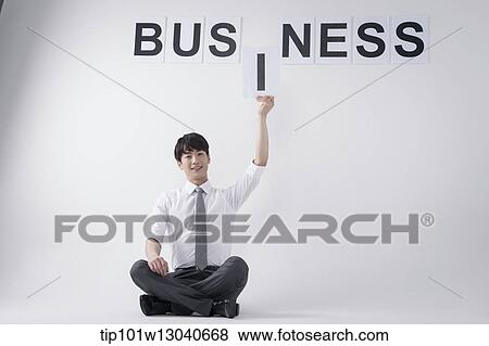 Stock Photo - a business man with the word business. Fotosearch