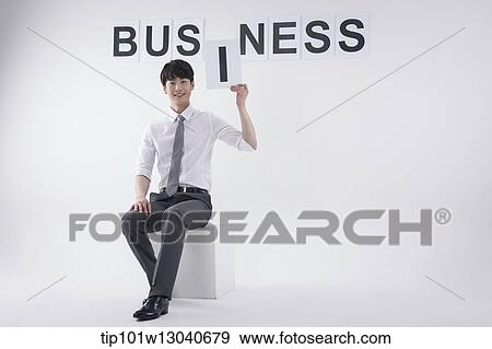 Stock Photo - a business man with the word business. Fotosearch