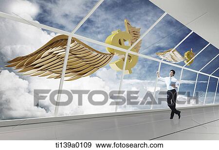 Stock Photo - a businessman inside a building . Fotosearch