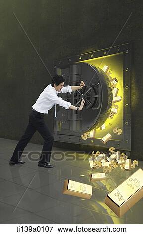 a businessman locking a safe View Large Photo Image Stock Photo - a businessman locking a safe. Fotosearch