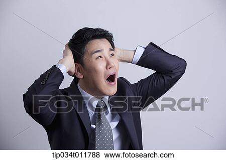 a businessman looking stressed View Large Photo Image Stock Photo - a businessman looking stressed. Fotosearch