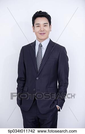 a businessman smiling View Large Photo Image Stock Image - a businessman smiling. Fotosearch
