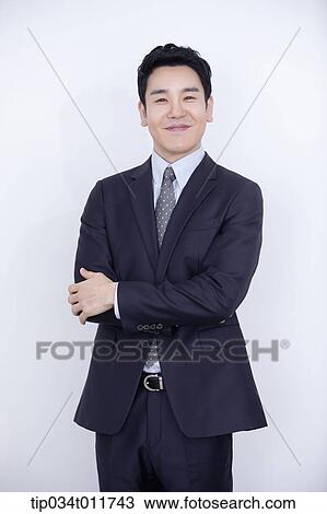 a businessman smiling View Large Photo Image Stock Image - a businessman smiling. Fotosearch