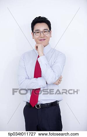 a businessman smiling View Large Photo Image Stock Photo - a businessman smiling. Fotosearch