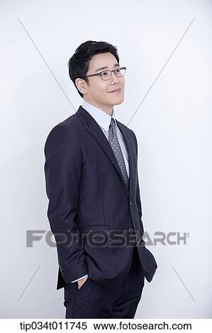 a businessman smiling View Large Photo Image Stock Photography - a businessman smiling. Fotosearch