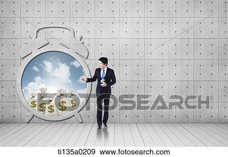 Stock Photo - a businessman standing next to a clock. Fotosearch