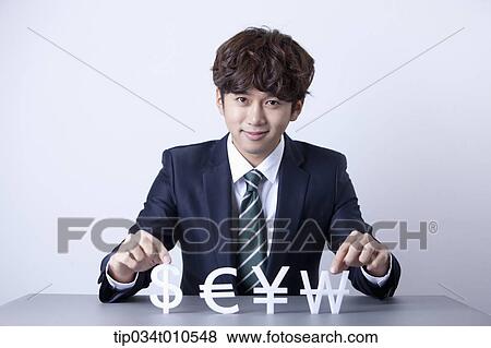a businessman with currency blocks View Large Photo Image Stock Photo - a businessman with currency blocks. Fotosearch