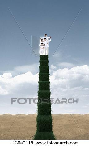 a family on top of stairs made out of grass View Large Photo Image Stock Photo - a family on top of stairs made out of grass. Fotosearch