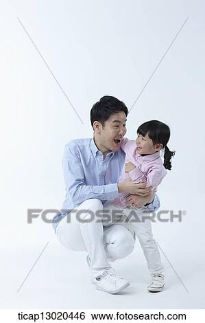 a father and a daughter hugging View Large Photo Image Stock Photograph - a father and a daughter hugging. Fotosearch