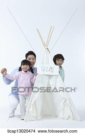 a father and kids playing with a tent View Large Photo Image Picture - a father and kids playing with a tent. Fotosearch