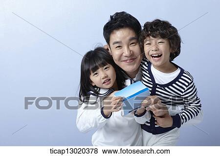 Stock Photo - a father and kids with a bankbook. Fotosearch
