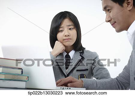 a father helping daughter with homework View Large Photo Image Stock Image - a father helping daughter with homework. Fotosearch