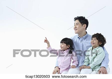 a father sitting with his kids View Large Photo Image Stock Image - a father sitting with his kids. Fotosearch