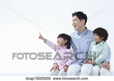 a father sitting with his kids View Large Photo Image Stock Photography - a father sitting with his kids. Fotosearch