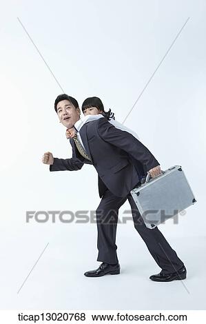 Stock Photo - a father with his daughter on his piggy back. Fotosearch