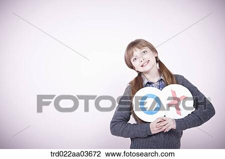 a girl holding boards saying correct and wrong View Large Photo Image Stock Image - a girl holding boards saying correct and wrong. Fotosearch