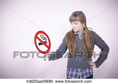 a girl holding boards saying no smoking View Large Photo Image Stock Image - a girl holding boards saying no smoking. Fotosearch