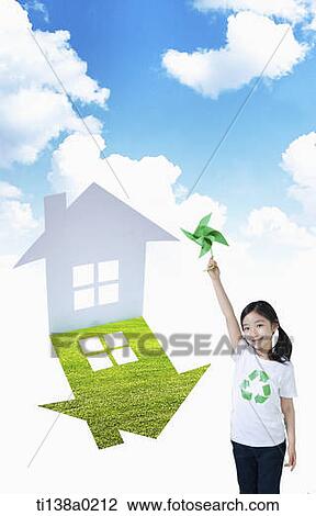 a girl next to a house shape View Large Photo Image Stock Image - a girl next to a house shape. Fotosearch