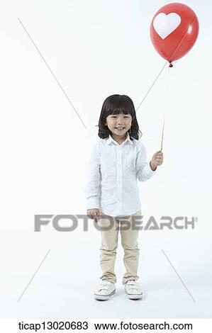 a girl with a balloon View Large Photo Image Stock Image - a girl with a balloon. Fotosearch