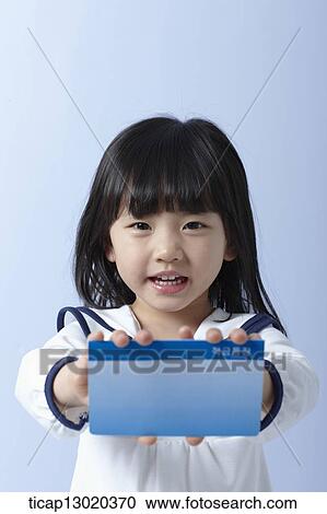 Stock Image - a girl with a bankbook. Fotosearch