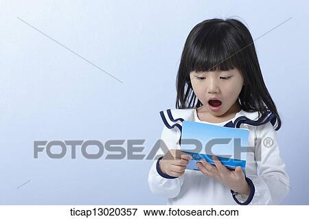 a girl with a bankbook View Large Photo Image Stock Photo - a girl with a bankbook. Fotosearch