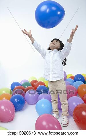 a girl with a lot of balloons View Large Photo Image Stock Image - a girl with a lot of balloons. Fotosearch