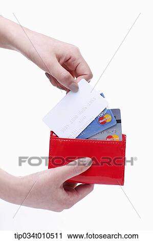 a hand taking credit cards from a wallet View Large Photo Image Stock Image - a hand taking credit cards from a wallet. Fotosearch