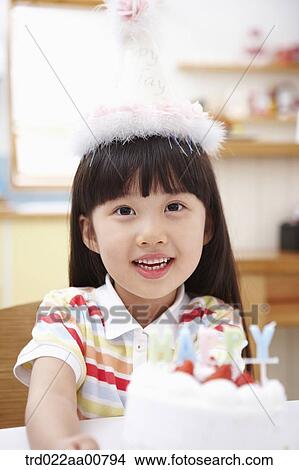 a kid giving you a birthday cake View Large Photo Image Picture - a kid giving you a birthday cake. Fotosearch