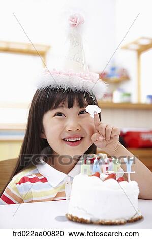 a kid playing with a birthday cake View Large Photo Image Stock Image - a kid playing with a birthday cake. Fotosearch