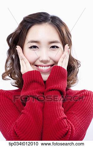 a lady in red sweater smiling View Large Photo Image Stock Image - a lady in red sweater smiling . Fotosearch