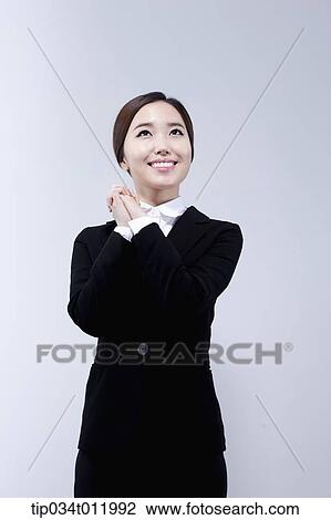 a lady smiling in business suit View Large Photo Image Stock Image - a lady smiling in business suit. Fotosearch