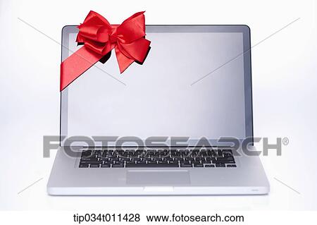 Stock Photo - a laptop wrapped in a gift band. Fotosearch